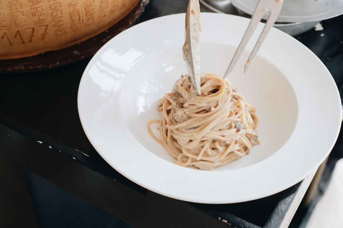 Serving Cheese Wheel Pasta